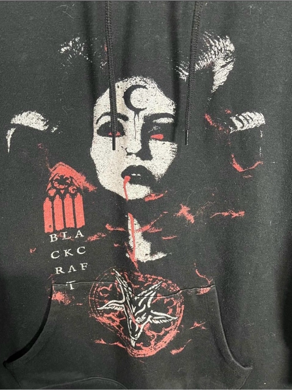 Black Graphic Pullover Hoodie with Red Gothic Face Design